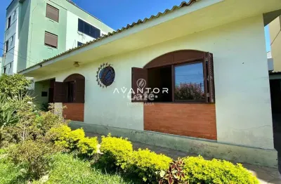 Casa no bairro medianeira de 3 dormitórios, suíte, (2) salas, lareira, (2) banhe
