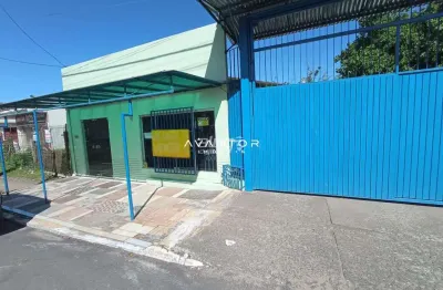 Sala comercial ampla com banheiro e estacionamento no bairro duque de caxias.