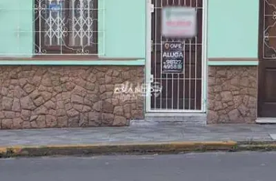 Sala comercial com 15 m² e banheiro. em ótima localização central.