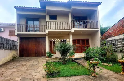 Sala comercial ampla com hall de entrada, lareira, banheiro e estacioanamento.