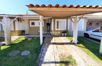 Casa 2 dormitórios, sala de estar, cozinha ampla, churrasqueira, garagem coberta