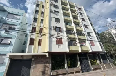 Apartamento central de 3 dormitórios, sala 2 ambientes com lareira, banheiro soc