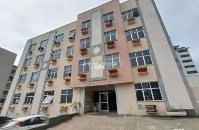 Sala comercial de 40 m², dividida em 3 salas e banheiro e estacionamento, no bai
