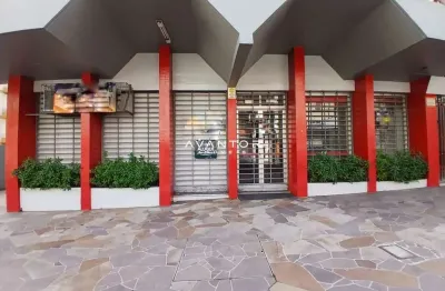 Loja sala comercial central composta por 4 salas, 4 banheiros, terraço e sacada.