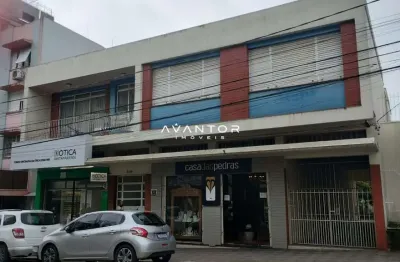 Duas salas comerciais e apartamento amplo para venda na região central