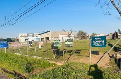 Linda área de aprox. 1 hectare dentro de camobi de frente para faixa- confira