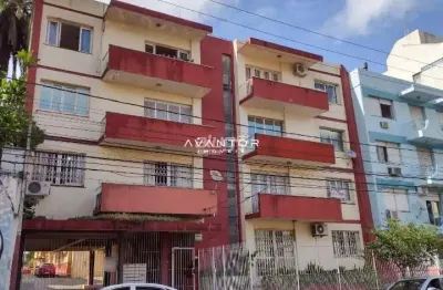 Apartamento central de 3 dormitórios, sala ampla, churrasqueira, terraço e garag