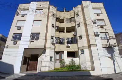 Apartamento central de 2 dormitórios, sala 2 ambientes, banheiro social, cozinha