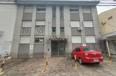 Apartamento central de 1 dormitório, sala de estar, cozinha, terraço amplo e est