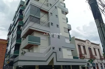 Apartamento á venda de 4 dormitórios, 1  suíte no centro de Santa Maria.