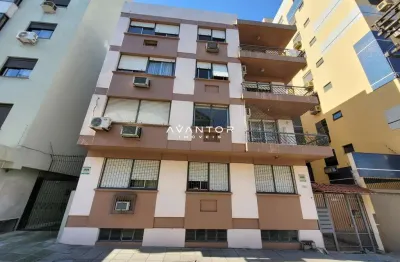 Apartamento de 2 dormitórios, cozinha semimobiliada e garagem no bairro centro e