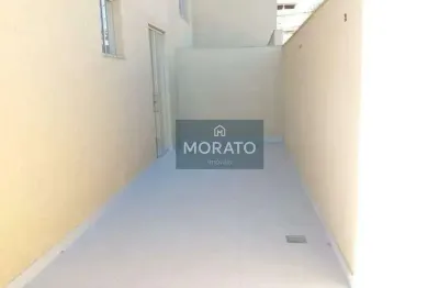 Área privativa com 2 quartos sendo 1 suíte com 2 vagas de garagem