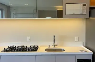 Apartamento mobiliado na praia brava – andar alto, face norte