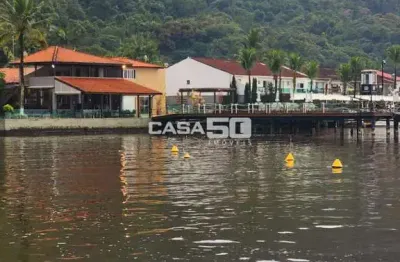 Casa em condomínio fechado com 2 quartos à venda na rod. ariovaldo de almeida de viana, 3969, balneario praia do perequê, guarujá, 90 m2 por r$ 750.000