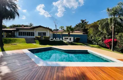 Casa em condomínio fechado com 4 quartos para alugar na Alameda das Tipuanas, 215, Sítios de Recreio Gramado, Campinas, 540 m2 por R$ 15.000