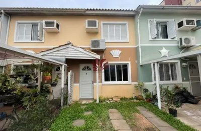Casa em condomínio fechado com 3 quartos à venda na avenida santos ferreira, 1180, marechal rondon, canoas por r$ 399.000