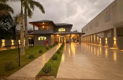 Casa em condomínio fechado com 6 quartos para alugar na Rua do Golfo, 545, Tabatinga, Caraguatatuba