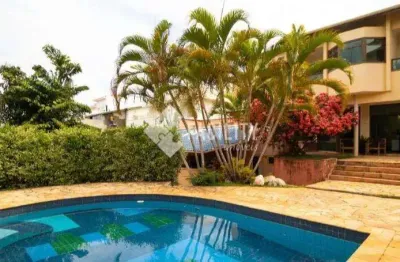 Casa em condomínio fechado com 4 quartos à venda na avenida copacabana, 419, loteamento caminhos de san conrado (sousas), campinas, 500 m2 por r$ 1.900.000