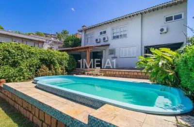 Casa com 4 quartos para alugar na Rua Carlos Huber, 91, Três Figueiras, Porto Alegre por R$ 15.000