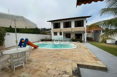 Casa em camboinhas com 03 quartos, piscina, churrasqueira e ótimo quintal.