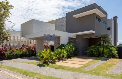 Casa a venda no condomínio bosque dos jatobás, em jundiaí sp, 3 suítes, escritório, piscina aquecida, área gourmet, closet, 4 vagas.