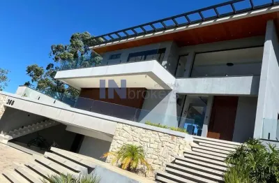 Casa a venda no condomínio terras da alvorada, em jundiaí sp  com 6 dorm. ( 3 suítes), piscina, adega, área gourmet, escritório, lareira, fire pit.