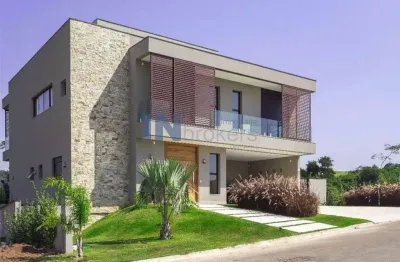 Casa a venda no condomínio fazenda serra azul, itupeva sp, com 5 suítes, closet, escritório, piscina, área gourmet,  vista livre e fundo para a mata.