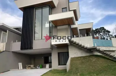 Casa com 4 dormitórios á venda, 477 m2 por r$ 3.600.000,00 - condomínio residencial jaguary -