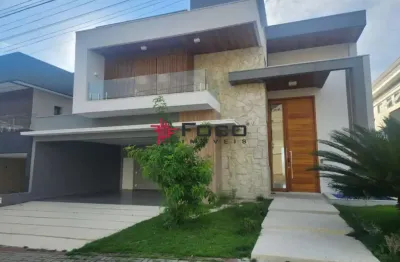 Casa com 4 suítes, 450m² por r$ 2.950.000,00 - condomínio residencial jaguary