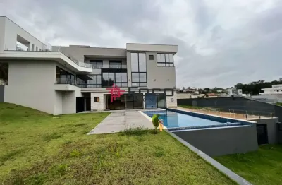 Casa em condomínio com 5 suítes, 600m2, reserva do paratehy - urbanova