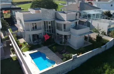 Casa com 4 suítes á venda no Condomínio Reserva do Paratehy - Urbanova