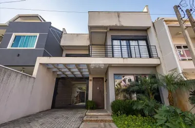 Casa em condomínio fechado com 3 quartos à venda na rua frederico stella, 400, cachoeira, curitiba, 169 m2 por r$ 950.000