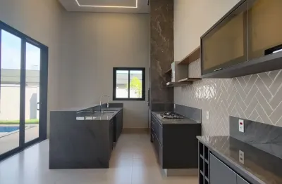 Espaço gramado, gourmet integrado, cozinha privativa