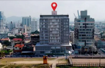 Frente mar, 03 suítes, r$ 1.700.000,00 no centro de navegantes - residencial ilha de ibiza