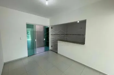 Sobrado geminado 2 suítes, bairro centro de navegantes/sc.