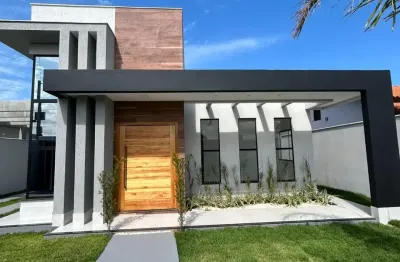 Casa moderna com pé direito duplo e integração total dos ambientes
