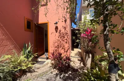 Casa encantadora com lazer completo – 3 quartos (2 suítes), biblioteca e área gourmet