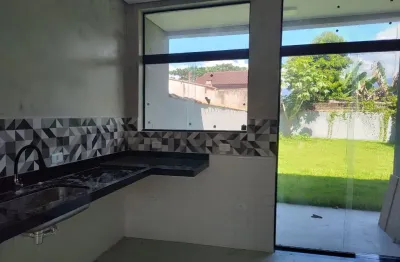 Casa nova à venda 3 dormitórios , a 700 metros da praia  no jardim rio da praia – bertioga/sp