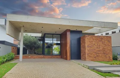 Casa térrea à venda no jardins de monet – maringá/pr residência oliveira monet | a harmonia perfeita entre natureza e arquitetura