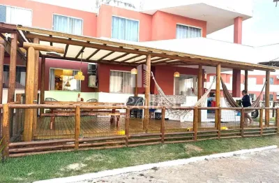 Apartamento mobiliado pé na areia à venda, condomínio praia da pérola, zona norte, ilhéus, bahia