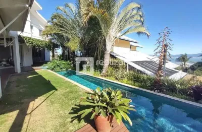Casa em condomínio fechado com 4 quartos à venda no cacupé, florianópolis  por r$ 7.060.000