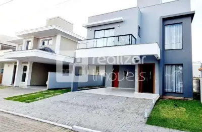 Casa em condomínio fechado com 4 quartos à venda no campeche, florianópolis  por r$ 2.400.000