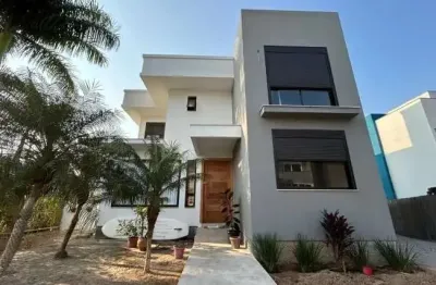 Casa em condomínio fechado com 4 quartos à venda no cachoeira do bom jesus, florianópolis  por r$ 2.395.000