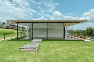 Casa de luxo no quinta da baroneza – bragança paulista/sp. 6 suítes, 1.410 m², piscina, gourmet, suíte master de 140 m², projeto triptyque arquitetos. venda r$ 23.760.000.