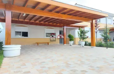 Conforto e lazer nesta bela casa localizada no prestigiado condomínio reserva anauá!