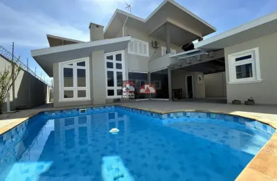 Casa de alto padrão com localização privilegiada no condomínio sunset park