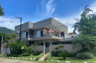 Incrível casa em condomínio pé na areia e com garagem para barco e jetsky. oportunidade única em ubatuba!
