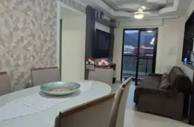 Apartamento à 800 metros da orla martim de sá e 5 minutos do centro, 2 dormitórios sendo 1 suíte com planejados.