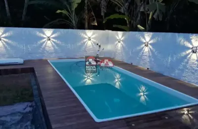 Casa rustica dentro do condomínio portal do patrimônio em caraguatatuba