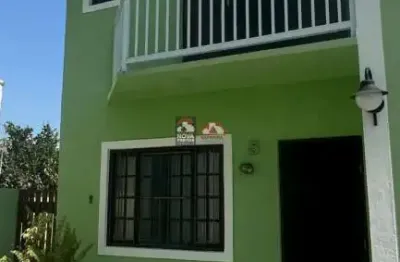Casa a venda em condomínio na martim de sa, proximo a praia